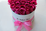 Hot Pink roses in round flower box - The Brilliant Roses