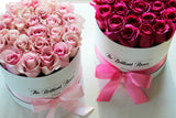 Hot Pink roses in round flower box - The Brilliant Roses