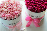 Pink roses in round flower box - The Brilliant Roses