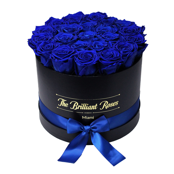 Blue ETERNAL roses in round flower box